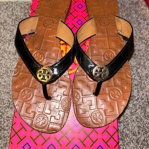Black Tory Burch flip flops $100. Size 8